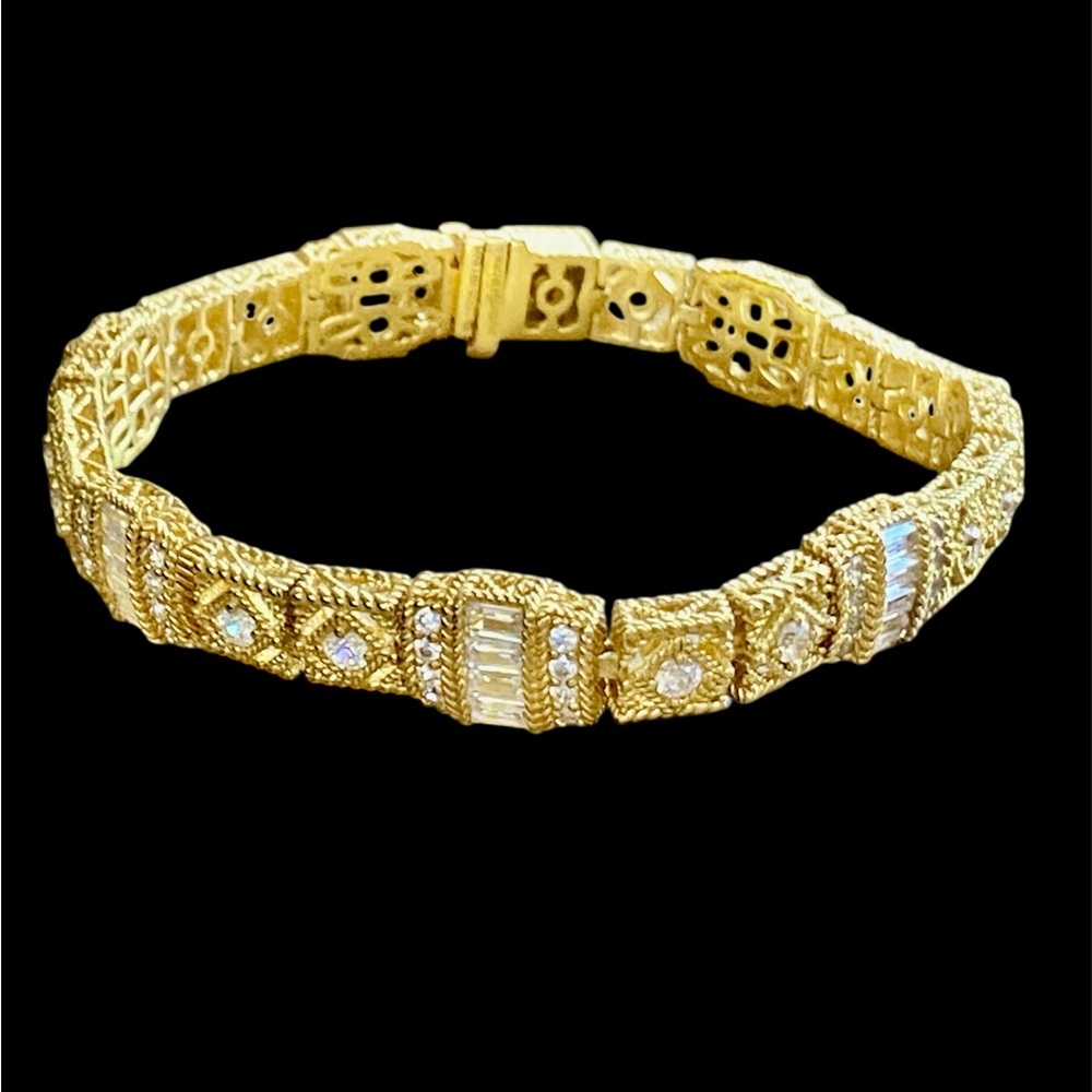 Judith Ripka gold washed tennis bracelet with cz’s